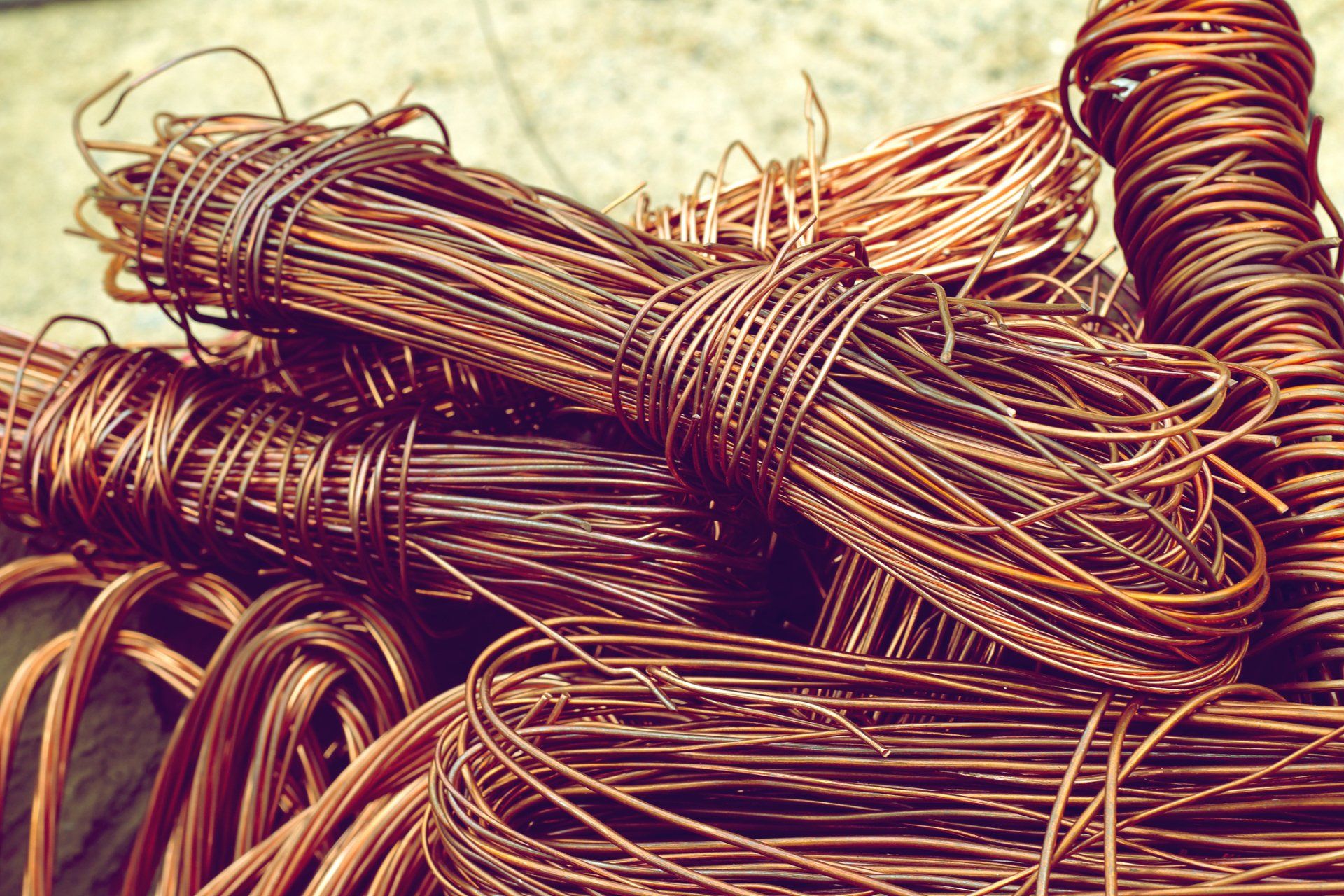 Bundles of bright bare copper wire ready for recycling